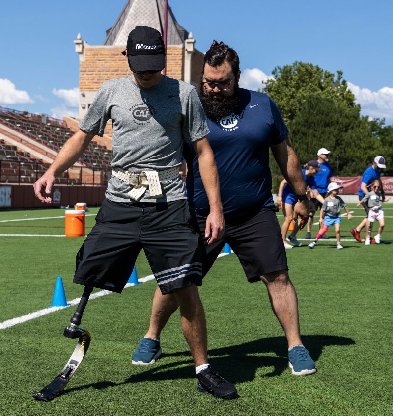 Alexander Chavez working with a patient at O and P Clinics of Colorado